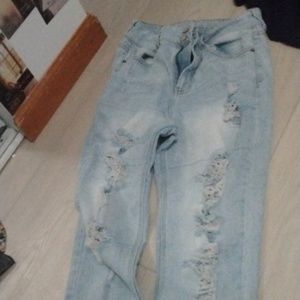 Light blue ripped skinny jeans
